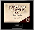 Logo Recognizing Heslin Law Firm's affiliation with AVVO Top Rated Lawyer